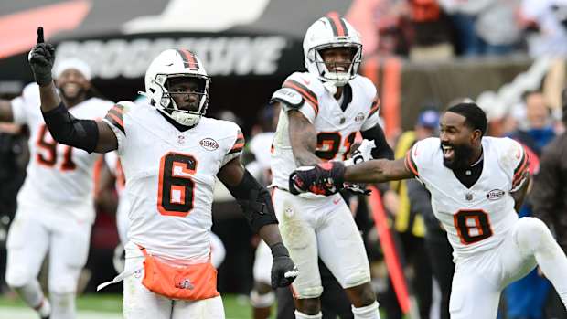 Oct 15, 2023; Cleveland, Ohio, USA; Cleveland Browns linebacker Jeremiah Owusu-Koramoah (6) and cornerback Denzel Ward (21) and wide receiver Elijah Moore (8) celebrate after San Francisco 49ers place kicker Jake Moody (not pictured) missed a field goal during the final seconds of the game at Cleveland Browns Stadium.